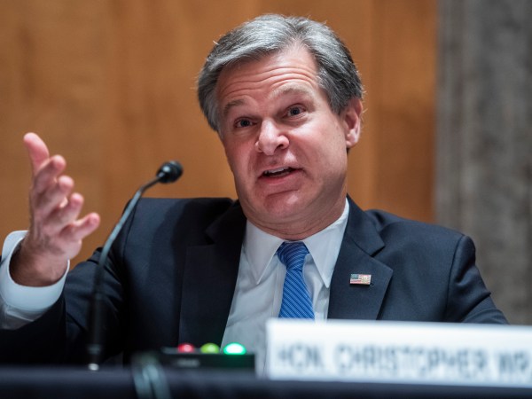 UNITED STATES - SEPTEMBER 24: FBI Director Christopher Wray, testifies during the Senate Homeland Security and Governmental Affairs Committee hearing titled “Threats to the Homeland,” in Dirksen Senate Office Building on Thursday, September 24, 2020. (Photo By Tom Williams/CQ Roll Call/Pool)