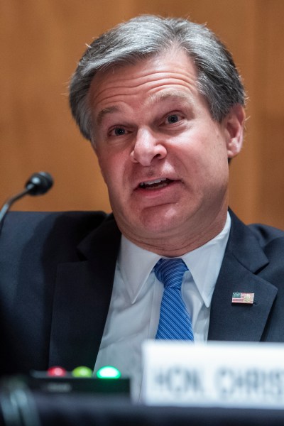 UNITED STATES - SEPTEMBER 24: FBI Director Christopher Wray, testifies during the Senate Homeland Security and Governmental Affairs Committee hearing titled “Threats to the Homeland,” in Dirksen Senate Office Building on Thursday, September 24, 2020. (Photo By Tom Williams/CQ Roll Call/Pool)