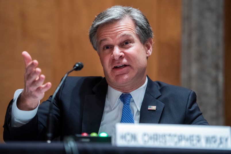 UNITED STATES - SEPTEMBER 24: FBI Director Christopher Wray, testifies during the Senate Homeland Security and Governmental Affairs Committee hearing titled “Threats to the Homeland,” in Dirksen Senate Office Building on Thursday, September 24, 2020. (Photo By Tom Williams/CQ Roll Call/Pool)