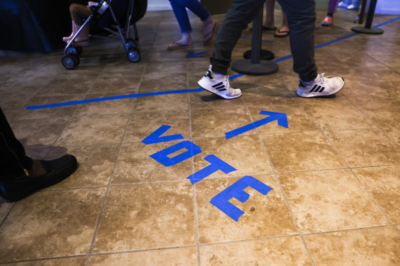 CHARLESTON, SC - OCTOBER 30: People head to the voting booths to cast their in-person absentee ballots at Seacoast Church West Ashley on October 30, 2020 in Charleston, South Carolina. (Photo by Michael Ciaglo/Getty Images)