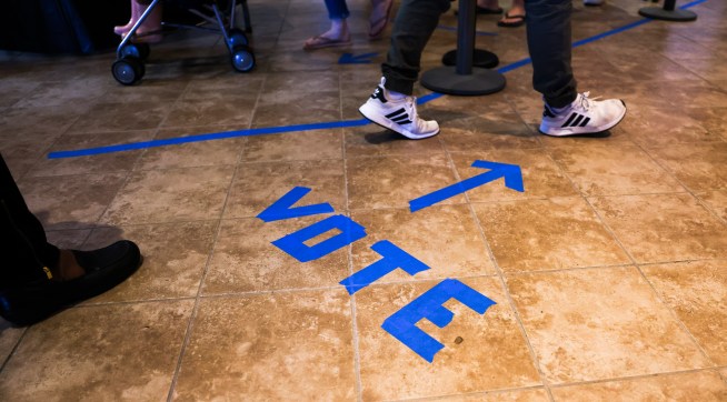 CHARLESTON, SC - OCTOBER 30: People head to the voting booths to cast their in-person absentee ballots at Seacoast Church West Ashley on October 30, 2020 in Charleston, South Carolina. (Photo by Michael Ciaglo/Getty Images)