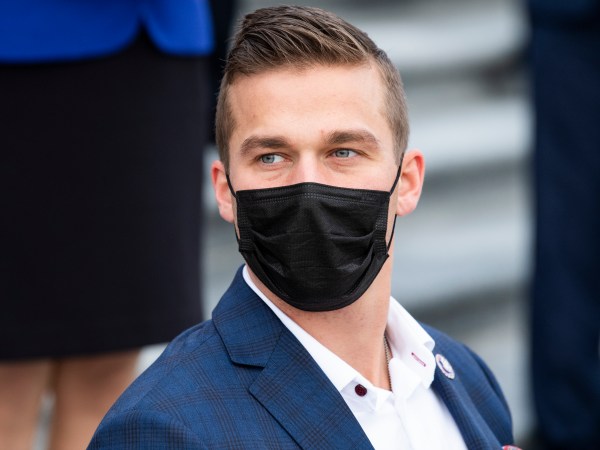 UNITED STATES - JANUARY 4: Rep. Madison Cawthorn, R-N.C., is seen during a group photo with freshmen members of the House Republican Conference on the House steps of the Capitol on Monday, January 4, 2021. (Photo By Tom Williams/CQ Roll Call)