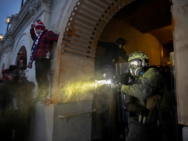 WASHINGTON D.C., USA - JANUARY 6: Trump supporters clash with police and security forces as people try to storm the US Capitol in Washington D.C on January 6, 2021. - Demonstrators breeched security and entered the Capitol as Congress debated the 2020 presidential election Electoral Vote Certification. (photo by Brent Stirton/Getty Images)