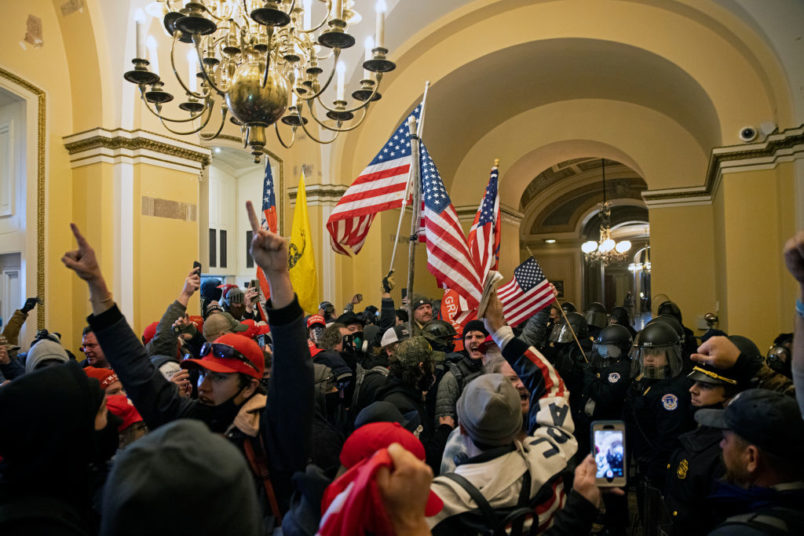 WASHINGTON D.C., USA - JANUARY 6: Supporters of US President Donald Trump protest inside the US Capitol on January 6, 2021, in Washington, DC. - Demonstrators breeched security and entered the Capitol as Congress debated the 2020 presidential election Electoral Vote Certification. (Photo by Brent Stirton/Getty Images)