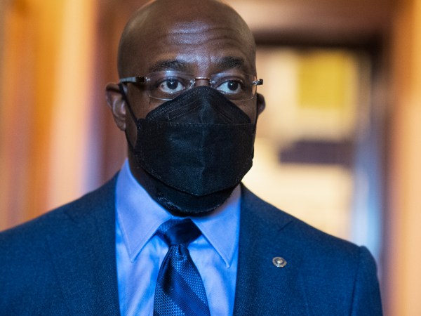 UNITED STATES - MARCH 23: Sen. Raphael Warnock, D-Ga., is seen during a Senate vote in the Capitol on Tuesday, March 23, 2021. (Photo By Tom Williams/CQ Roll Call)