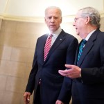 UNITED STATES - JANUARY 12: Vice President Joe Biden, left, and Senate Majority Leader Mitch McConnell, R-Ky., make their way to the House floor for President Obama's State of the Union address, January 12, 2016. (Photo By Tom Williams/CQ Roll Call)