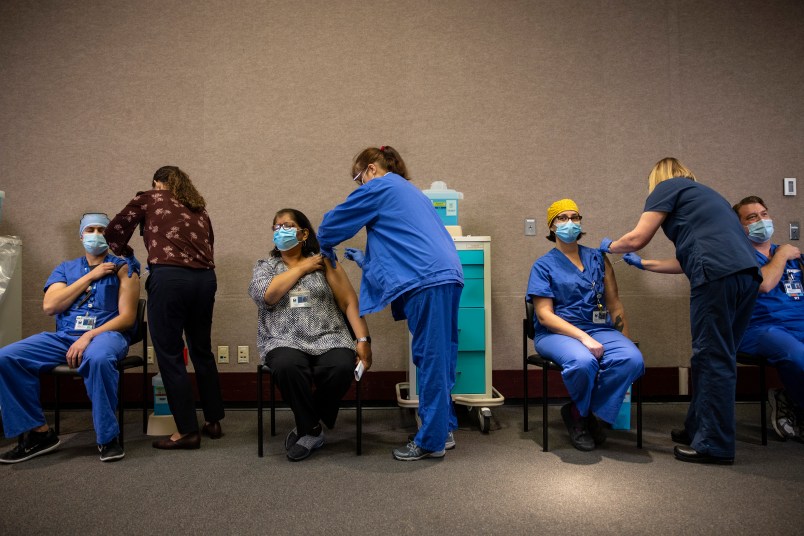 PORTLAND, OR - DECEMBER 16 : Healthcare workers get the Pfizer-BioNTech COVID-19 vaccination at the Legacy Emanuel Medical Center on December 16, 2020 in Portland, Oregon. Today was the first day of vaccinations in Oregon. (Photo by Paula Bronstein/Getty Images)
