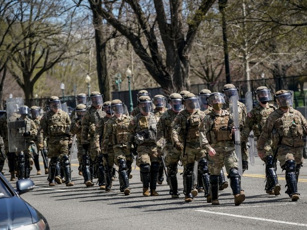 WASHINGTON, DC - APRIL 2: National Guard troops arrive along Constitution Avenue as law enforcement responds to a security incident near the U.S. Capitol on April 2, 2021 in Washington, DC. (Photo by Drew Angerer/Getty Images)