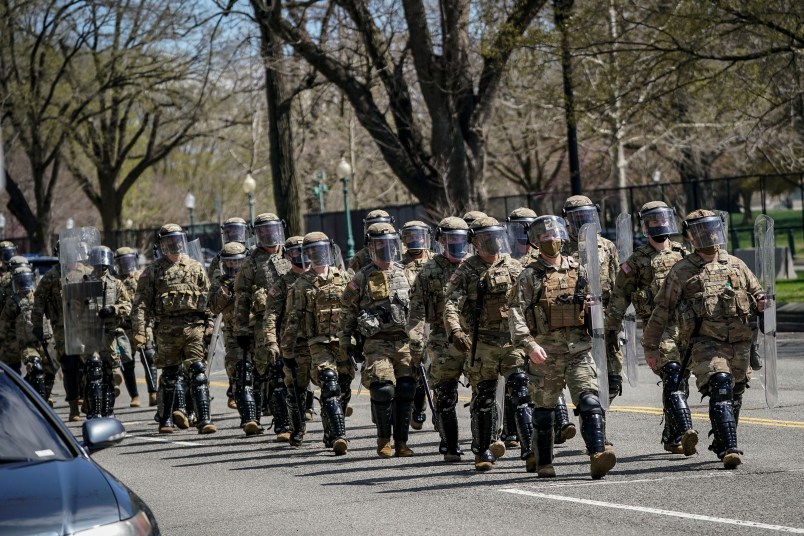 WASHINGTON, DC - APRIL 2: National Guard troops arrive along Constitution Avenue as law enforcement responds to a security incident near the U.S. Capitol on April 2, 2021 in Washington, DC. (Photo by Drew Angerer/Getty Images)
