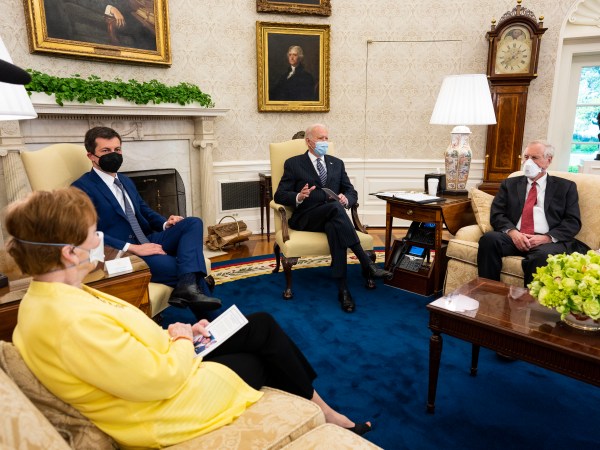President Joe Biden makes remarks during a meeting with with a bipartisan group of Members of Congress to discuss historic investments in the American Jobs Plan, in the Oval Office at the White House, Monday, April, 19, 2021. (Photo by Doug Mills/The New York Times)