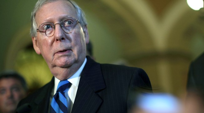 WASHINGTON, DC - JULY 11:  U.S. Senate Majority Leader Sen. Mitch McConnell (R-KY) listens during a news briefing after the weekly Senate Republican Policy Luncheon July 11, 2017 at the Capitol in Washington, DC. Sen. McConnell announced that Senate will delay its recess to the third week of August.  (Photo by Alex Wong/Getty Images)