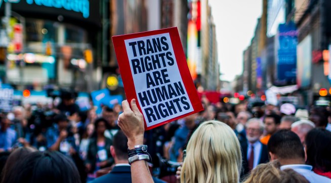 TIMES SQUARE NYC, NEW YORK CITY, NEW YORK, UNITED STATES - 2017/07/26: On July 26, 2017, after a series of tweets by President Donald Trump, which proposed to ban transgender people from military service, thousands of New Yorkers took the streets of in opposition.  Thousands of transgender soldiers are currently serving in all branches of the United States Armed forces. (Photo by Michael Nigro/Pacific Press/LightRocket via Getty Images)