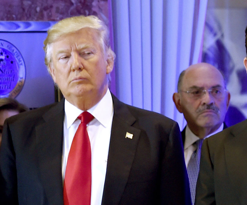 Donald Trump arrives for a press conference at Trump Tower in New York, as Allen Weisselberg, chief financial officer of The Trump Organization, looks on January 11, 2017. (zTIMOTHY A. CLARY/AFP via Getty Images)