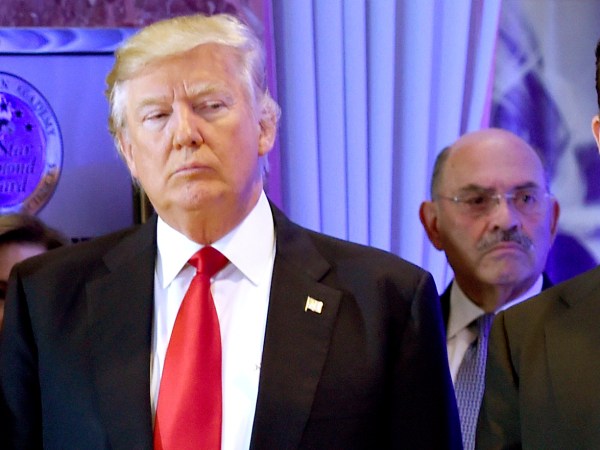 Donald Trump arrives for a press conference at Trump Tower in New York, as Allen Weisselberg, chief financial officer of The Trump Organization, looks on January 11, 2017. (zTIMOTHY A. CLARY/AFP via Getty Images)
