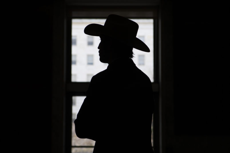 UNITED STATES - NOVEMBER 18: A man wearing cowboy hat is seen at the horseshoe entrance of Rayburn Building on Wednesday, November 18, 2020. (Photo By Tom Williams/CQ Roll Call)