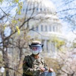 UNITED STATES - APRIL 2: U.S. National Guardsmen stand guard near Constitution Avenue NW after a man was shot during a confrontation with Capitol Police at the north barricade entrance to the Capitol on Friday, April 2, 2021. (Photo By Tom Williams/CQ Roll Call)