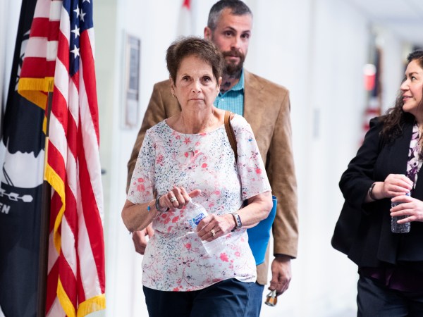 UNITED STATES - MAY 27: Gladys Sicknick, center, the mother of late Capitol Police Officer Brian Sicknick, D.C. Metropolitan Police Department Officer Michael Fanone,  and Sandra Garza, the companion of the late officer arrive to a meeting with Sen. Ron Johnson, R-Wis., to urge Republican senators to support a bipartisan commission to investigate the January 6th attack on the Capitol, in Hart Building on Thursday, May 27, 2021. Sicknick died of two strokes after a day after defending the Capitol from rioters. (Photo By Tom Williams/CQ Roll Call)