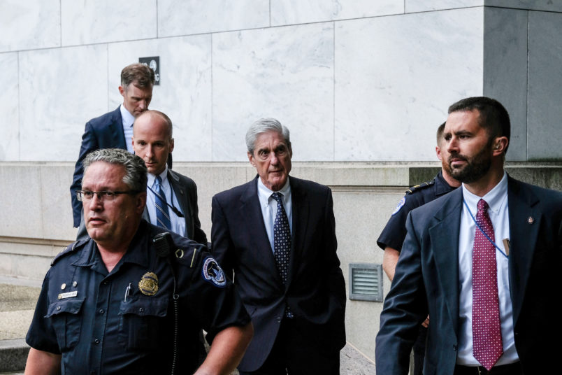 WASHINGTON, DC - JULY 24: Former Special Counsel Robert Mueller (center) is seen leaving after testifying to the House Judiciary Committee about his report on Russian interference in the 2016 presidential election on Capitol Hill on July 24, 2019 in Washington, DC. Mueller dismissed President Trump's claims of total exoneration before the House Judiciary Committee earlier in the day on Wednesday. (Photo by Alex Wroblewski/Getty Images)