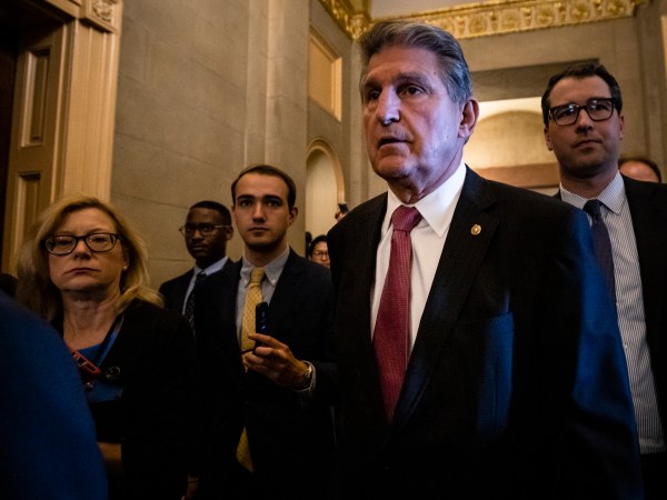 WASHINGTON, DC - JUNE 23: U.S. Sen. Joe Manchin (D-WV) is swarmed by reporters as he leaves a meeting between a bipartisan group of Senators and White House officials as they attempt to come to a deal on the Biden administrations proposed infrastructure plan at the U.S. Capitol on June 23, 2021 in Washington, DC. After initial negotiations between the White House and Senate Republicans fell through a new bi partisan group of Senators came together with the hopes of reaching a deal for a much need infrastructure spending plan. (Photo by Samuel Corum/Getty Images) *** Local Caption *** Joe Manchin