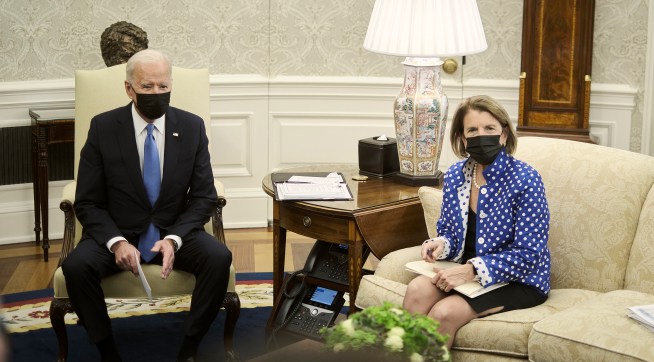 WASHINGTON, DC - MAY 13, 2021: President Joe Biden makes a brief statement to the press during a meeting with a group of republican senators, including Sen. Shelley Capito (R-WV), right, to discuss the administration’s infrastructure plan, in the Oval Office at the White House in Washington, D.C., on May 13, 2021. CREDIT: T.J. Kirkpatrick for The New York Times