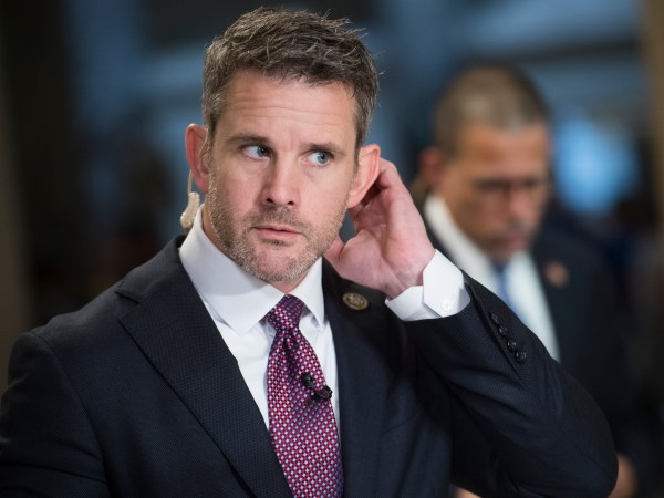 UNITED STATES - JUNE 21: Reps. Adam Kinzinger, R-Ill., left, and Anthony Brown, D-Md., prepare for television interviews in the Capitol on Friday, June 21, 2019. (Photo By Tom Williams/CQ Roll Call)