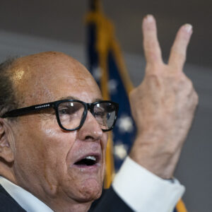 WASHINGTON, DC - NOVEMBER 19: Rudy Giuliani accuses people of voting twice as he speaks to the press about various lawsuits related to the 2020 election,  inside the Republican National Committee headquarters on November 19, 2020 in Washington, DC. President Donald Trump, who has not been seen publicly in several days, continues to push baseless claims about election fraud and dispute the results of the 2020 United States presidential election. (Photo by Drew Angerer/Getty Images)