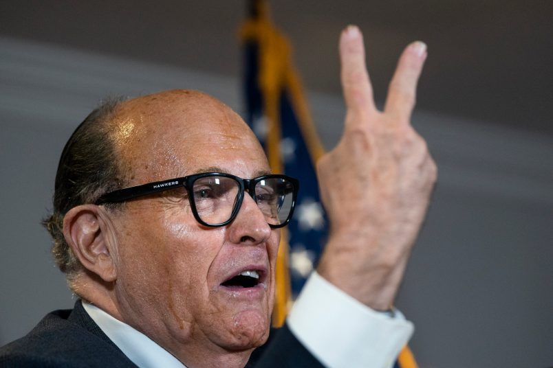 WASHINGTON, DC - NOVEMBER 19: Rudy Giuliani accuses people of voting twice as he speaks to the press about various lawsuits related to the 2020 election,  inside the Republican National Committee headquarters on November 19, 2020 in Washington, DC. President Donald Trump, who has not been seen publicly in several days, continues to push baseless claims about election fraud and dispute the results of the 2020 United States presidential election. (Photo by Drew Angerer/Getty Images)