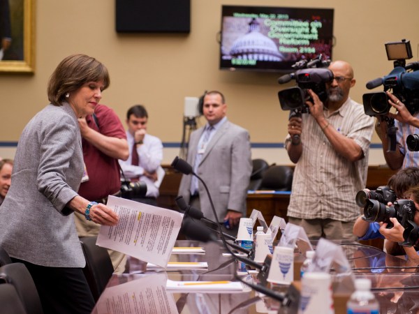 UNITED STATES - MAY 22: Lois Lerner, director of exempt organizations for the Internal Revenue Service, arrives for a House Oversight and Government Reform Committee hearing on the investigation of the IRS's targeting of political groups. Lerner invoked her Fifth Amendment right to not testify. Lerner cause a protest from some committee members when she offered an opening statement and engaged in dialogue with members before invoking her right. (Photo By Tom Williams/CQ Roll Call)