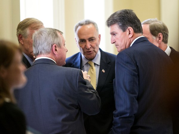 WASHINGTON, DC - JULY 9: (L-R) Sen. Angus King (I-ME), Sen. Dick Durbin (D-IL), Sen. Chuck Schumer (D-NY), Sen. Tom Carper (D-DE) and Sen. Joe Manchin (D-WV) speak with each other after a closed-door meeting with fellow Democratic Senators, on Capitol Hill, July 9, 2013 in Washington, DC. The senators fielded questions from the media on student loan legislation. (Photo by Drew Angerer/Getty Images)