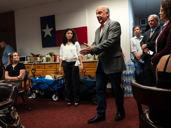AUSTIN, TX - JULY 10: Texas state Rep. Chris Turner, D-Arlington, speaks to a group of people waiting to testify against renewed efforts by Texas Republicans to pass voting restrictions as state lawmakers hold committee hearings on election integrity bills at the State Capitol on July 10, 2021 in Austin, Texas. Hundreds of people signed up to testify before lawmakers as Texas Republicans move forward with their effort to overhaul the state's voting laws during the 87th Legislature's special session. (Photo by Tamir Kalifa/Getty Images)