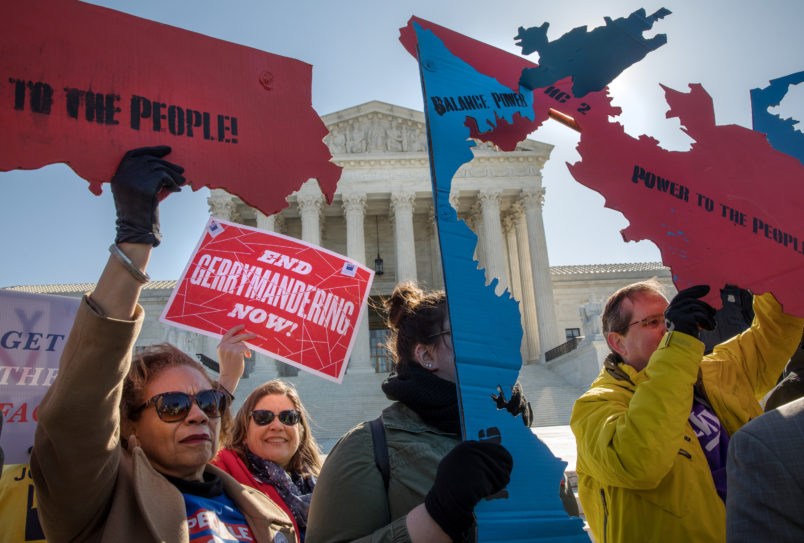 WASHINGTON,DC-MAR26: Demonstrators protest against gerrymandering at a rally at the Supreme Court during the gerrymandering cases Lamone v. Benisekand Rucho v. Common Cause.(Photo by Evelyn Hockstein/For The Washington Post)