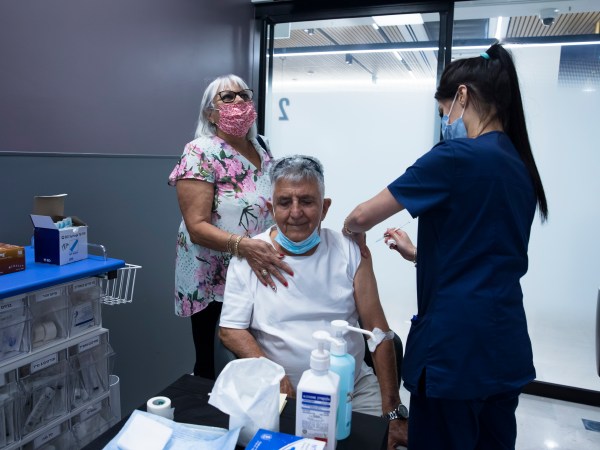 Benny Gantz (C), A former IDF Chief and the head of Israeli Resilience party speaks to supporters during an election campaign event in Tel Aviv. Israelis will vote in a parliamentary election on April 9, choosing among party lists of candidates to serve in the 121-seat Knesset