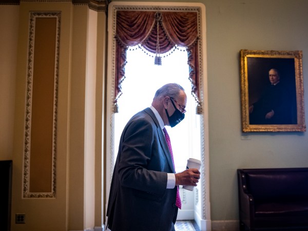 WASHINGTON, DC - AUGUST 10: U.S. Senate Majority Leader Chuck Schumer (D-NY) heads to his office in the U.S. Capitol Building on August 10, 2021 in Washington, DC. The Senate will vote today on the $1 trillion infrastructure bill ahead of August recess. (Photo by Samuel Corum/Getty Images) *** Local Caption *** Chuck Schumer