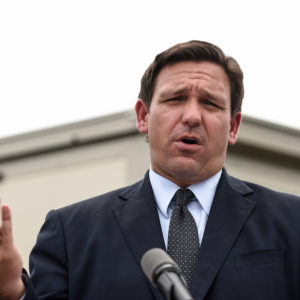 ORLANDO, FLORIDA, UNITED STATES - 2021/08/16: Florida Governor, Ron DeSantis holds a press conference to announce the opening of a monoclonal antibody treatment site to help COVID-19 patients recover at Camping World Stadium in Orlando. DeSantis stated that the site will offer the Regeneron treatment, and will operate 7 days a week, treating up to 320 patients a day. (Photo by Paul Hennessy/SOPA Images/LightRocket via Getty Images)
