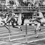 Milton Campbell (second from the left) is shown at the finish of the Decathlon 100-meter hurdles event at the 1952 Olympics. Campbell won the Gold in the event. Helsinki, Finland, 1954. PhotoQuest/ Getty Images.