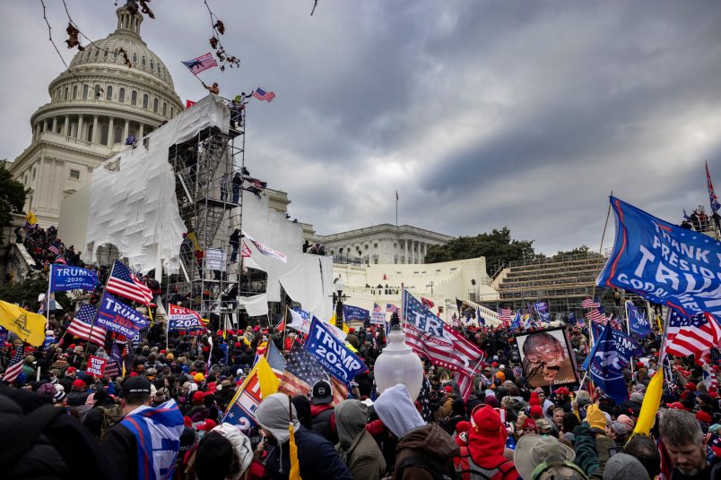 WASHINGTON D.C., USA - JANUARY 6: Trump supporters clash with police and security forces as people try to storm the US Capitol in Washington D.C on January 6, 2021. Demonstrators breeched security and entered the Capitol as Congress debated the 2020 presidential election Electoral Vote Certification. (photo by Brent Stirton/Getty Images)