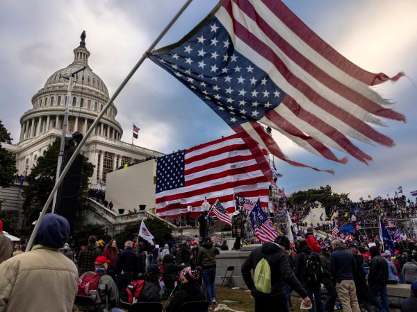 nation's capital to protest the ratification of President-elect Joe Biden's Electoral College victory over President Trump in the 2020 election. A pro-Trump mob later stormed the Capitol, breaking windows and clashing with police officers. Five people died as a result.  (Photo by Brent Stirton/Getty Images)