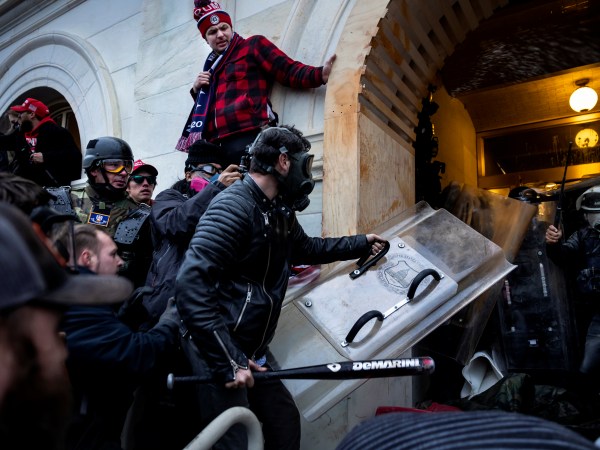 WASHINGTON D.C., USA - JANUARY 6: Trump supporters clash with police and security forces as people try to storm the US Capitol in Washington D.C on January 6, 2021. - Demonstrators breeched security and entered the Capitol as Congress debated the 2020 presidential election Electoral Vote Certification. (photo by Brent Stirton/Getty Images)