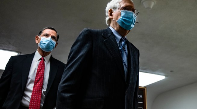 WASHINGTON, DC - FEBRUARY 12: Senate Minority Leader Mitch McConnell (R-KY) walks through the Senate subway on his way to the fourth day of the Senates second impeachment trial of former President Donald Trump at the U.S. Capitol on February 12, 2021 in Washington, DC. Trump’s defense team begins their presentation of the defense that Trump should not be held responsible for the January 6th attack at the U.S. Capitol on First Amendment grounds and the fact that he is no longer in office. (Photo by Samuel Corum/Getty Images) *** Local Caption *** Mitch McConnell