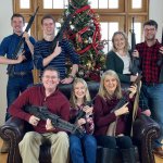 Massie family holding guns