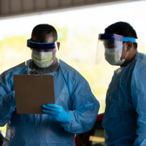 SPRINGFIELD, TN - APRIL 18:  Medical personnel work at a drive thru coronavirus (covid-19) testing site at Robertson County Fairgrounds on April 18, 2020 in Springfield, Tennessee. Tennessee drive thru testing sites now allow those without symptoms of coronavirus (covid-19) to receive testing. (Photo by Brett Carlsen/Getty Images)
