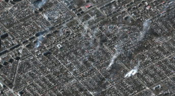 RUSSIANS INVADE UKRAINE -- MARCH 22, 2022:  01 Maxar satellite imagery of the overview of fires burning in residential area, Livoberezhnyi District, Mariupol, Ukraine. 22march2022_wv3.   Please use: Satellite image (c) 2022 Maxar Technologies.