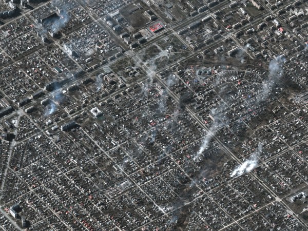 RUSSIANS INVADE UKRAINE -- MARCH 22, 2022:  01 Maxar satellite imagery of the overview of fires burning in residential area, Livoberezhnyi District, Mariupol, Ukraine. 22march2022_wv3.   Please use: Satellite image (c) 2022 Maxar Technologies.