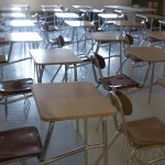 Empty chairs and desks in a high school classroom (Photo by James Leynse/Corbis via Getty Images)