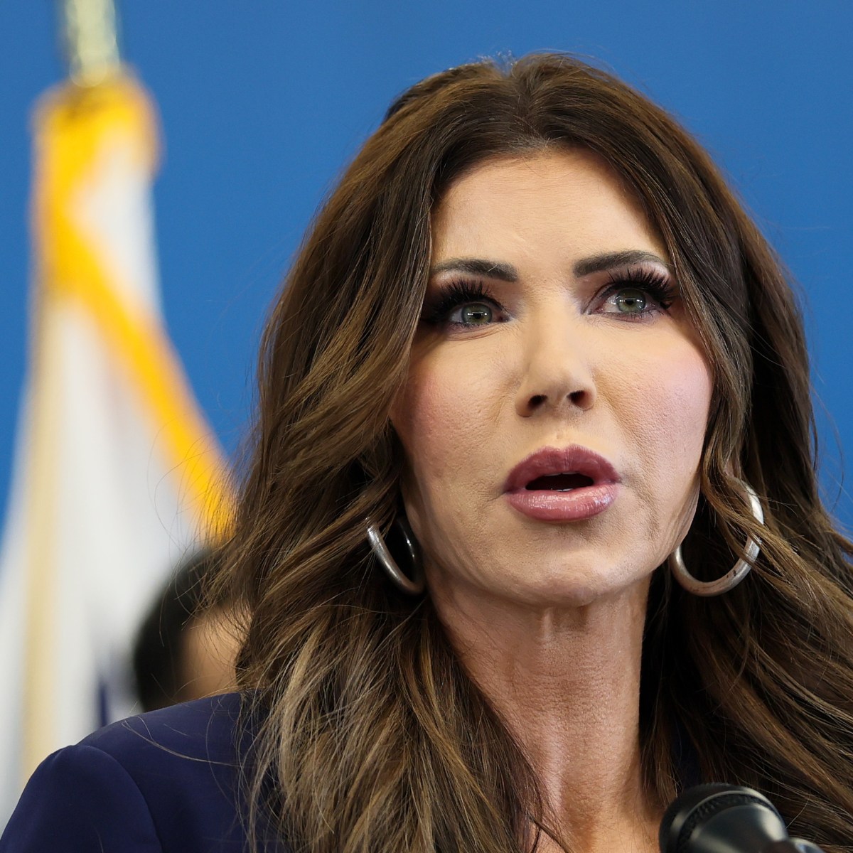 Defiant Protesters Face Noem After ICE Shooting: ‘We Have To Be Here’