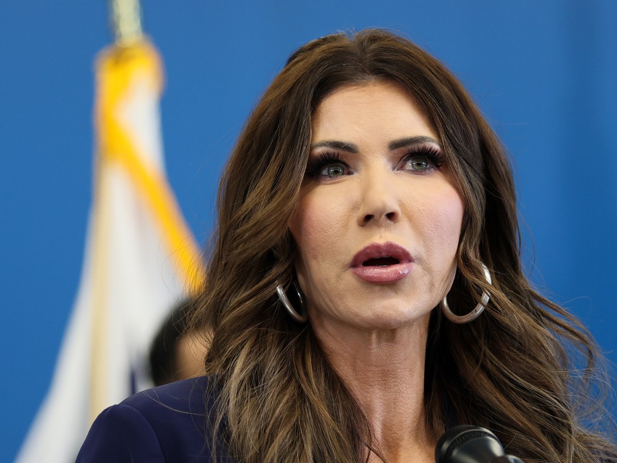 Defiant Protesters Face Noem After ICE Shooting: ‘We Have To Be Here’